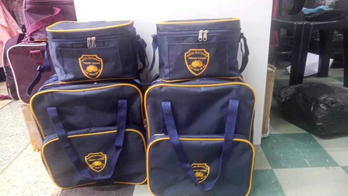 Navy school bag and lunch bag set with embroidered gold school shields