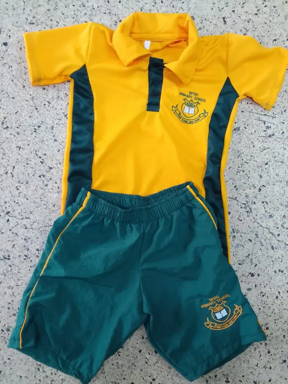 Yellow and green Sifiso Primary School sports kit with embroidered school crest